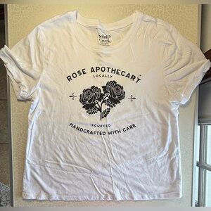 Schittt$ Creek | ladies Rose Apothecary t-shirt. Size: L/G